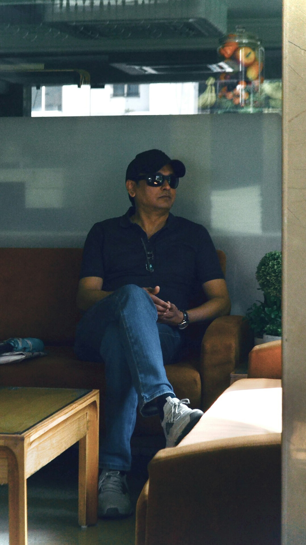 Person actively listening during a small group discussion indoors