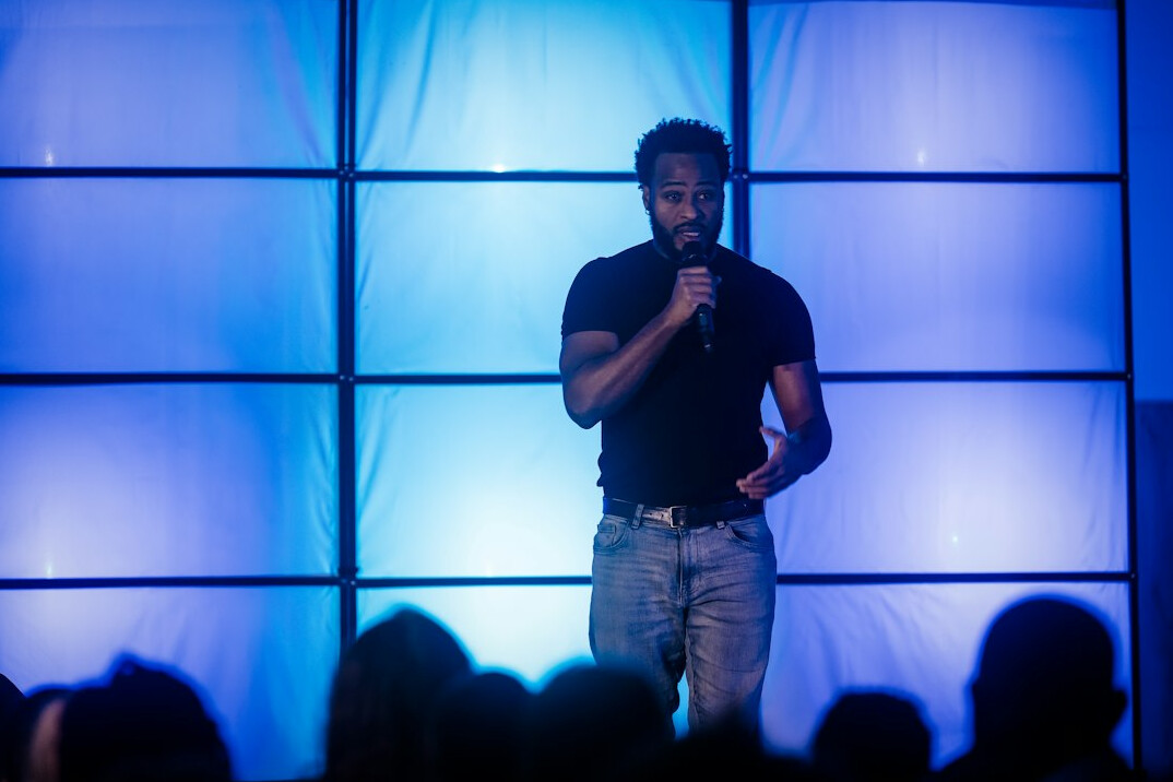 person speaking at conference