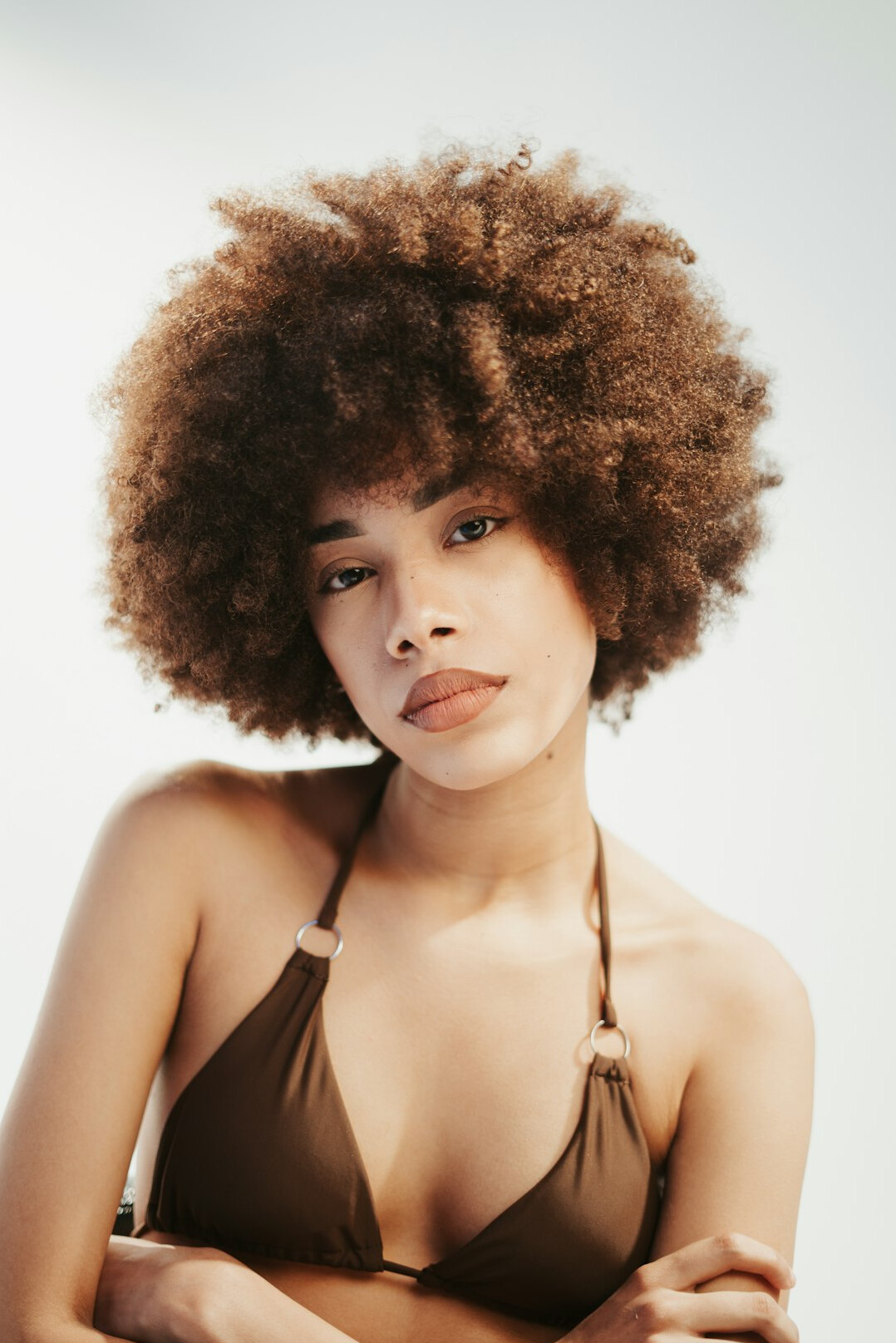 Studio portrait of an Afro-Brazilian woman editor in her 20s