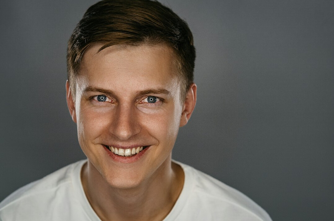 man smiling confidently