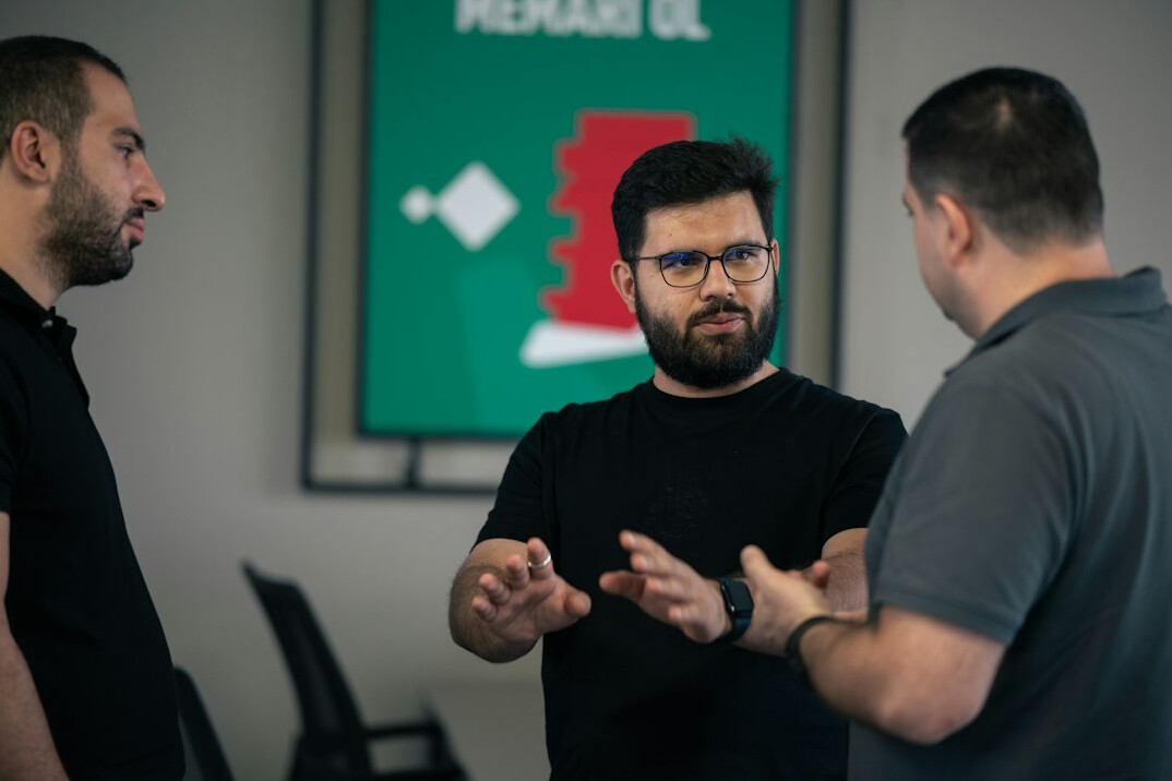 team discussing ideas in office