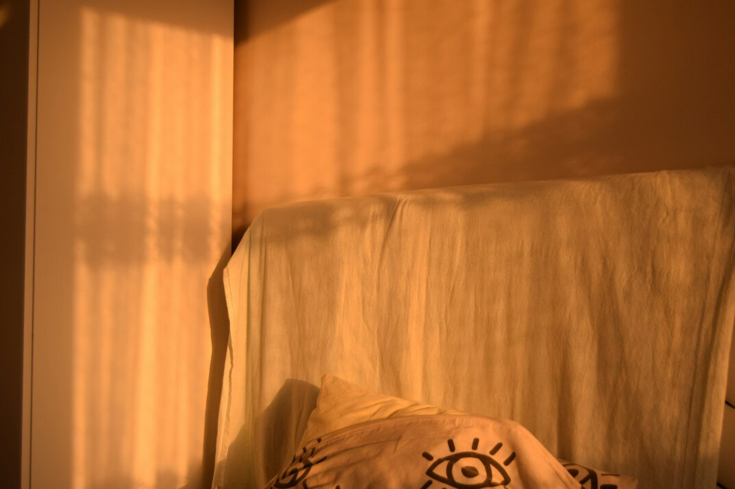 person journaling in morning light