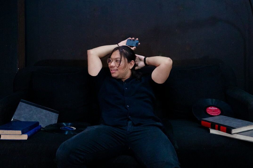 reading books on couch
