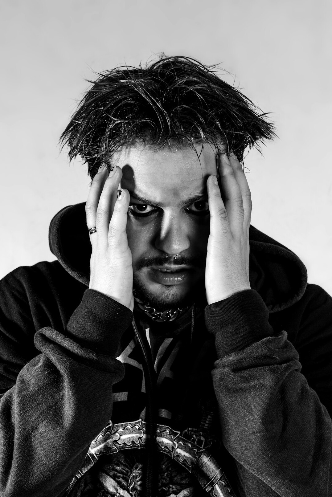 Studio portrait of a Brazilian man editor in his 40s