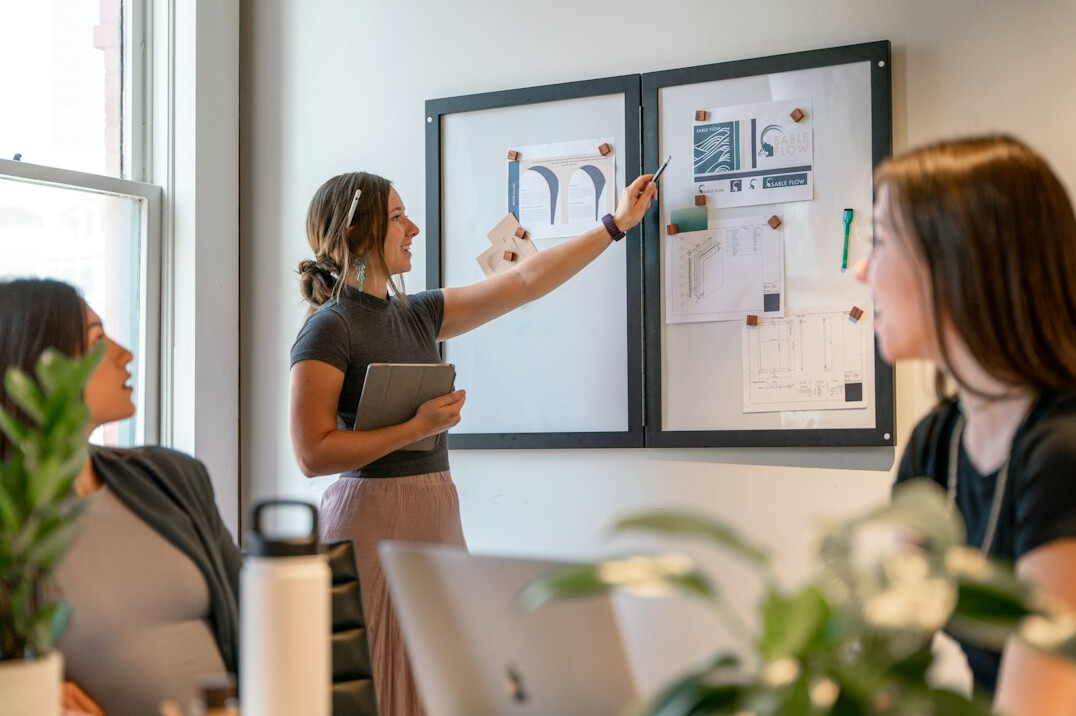 team discussing ideas in office