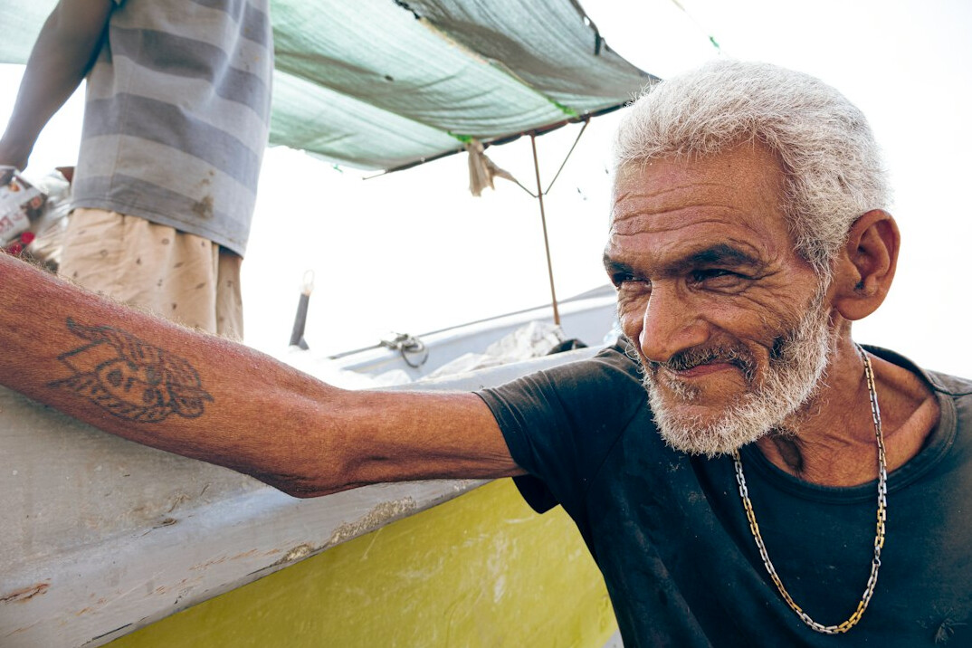 Studio portrait of a Brazilian man editor in his 50s